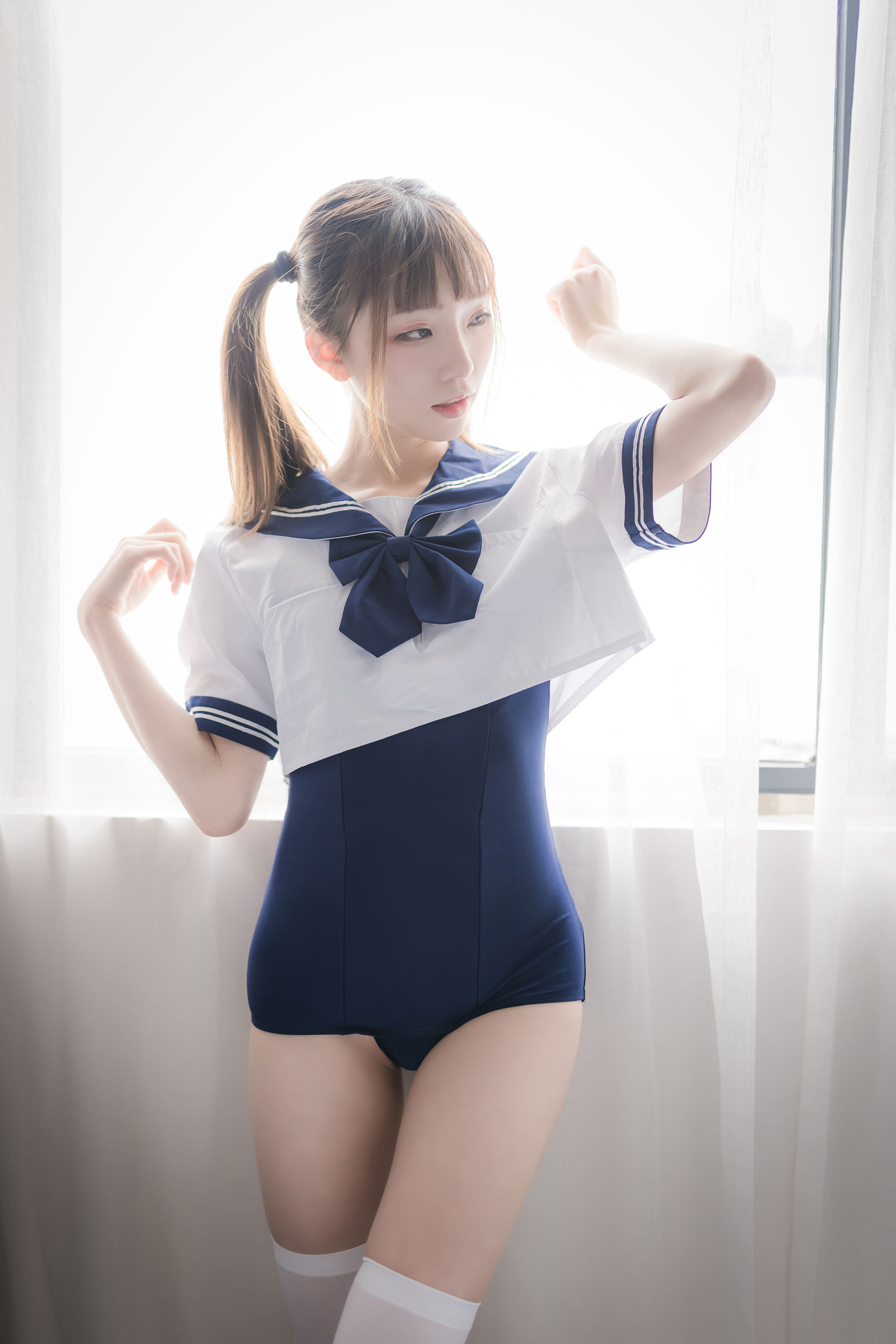 动漫博主Kitaro_绮太郎 – 泳装JK [43P]